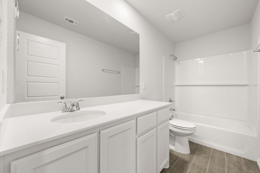 Representative exterior photo of a completed home built from the Jarvis by Impression Homes in Redden Farms, Midlothian, TX (Image 17).