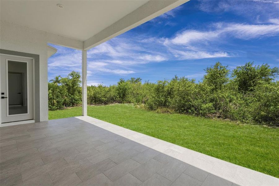 Exterior details and patio area of a home in , Port Charlotte (Image 3).