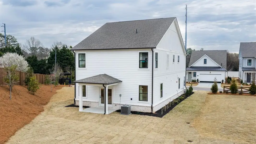 Exterior details and patio area of a home in The Village at Sandy Plains, Marietta (Image 4).