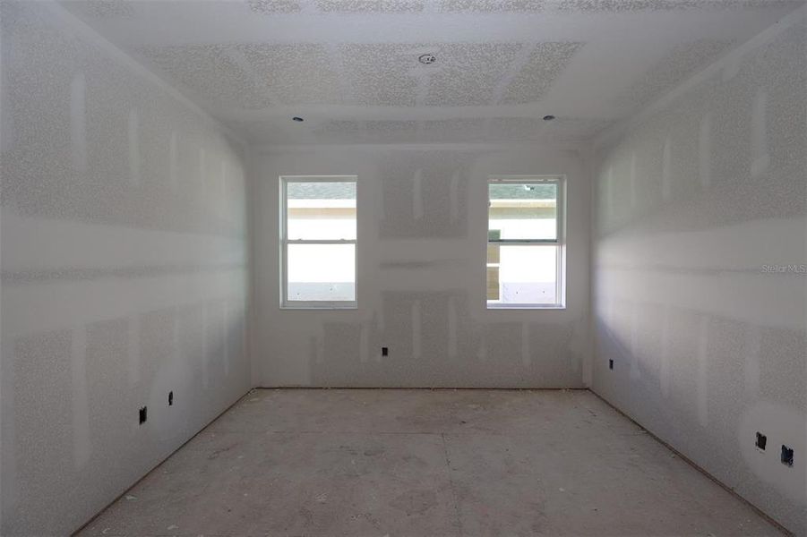 In-progress construction of a new home in Lake Star at Ovation, Winter Garden, FL (Image 26).