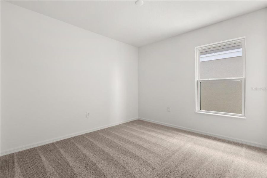 Spacious, unfurnished interior of a new home in Reserve at Forest Lake II, Lake Wales (Image 11).