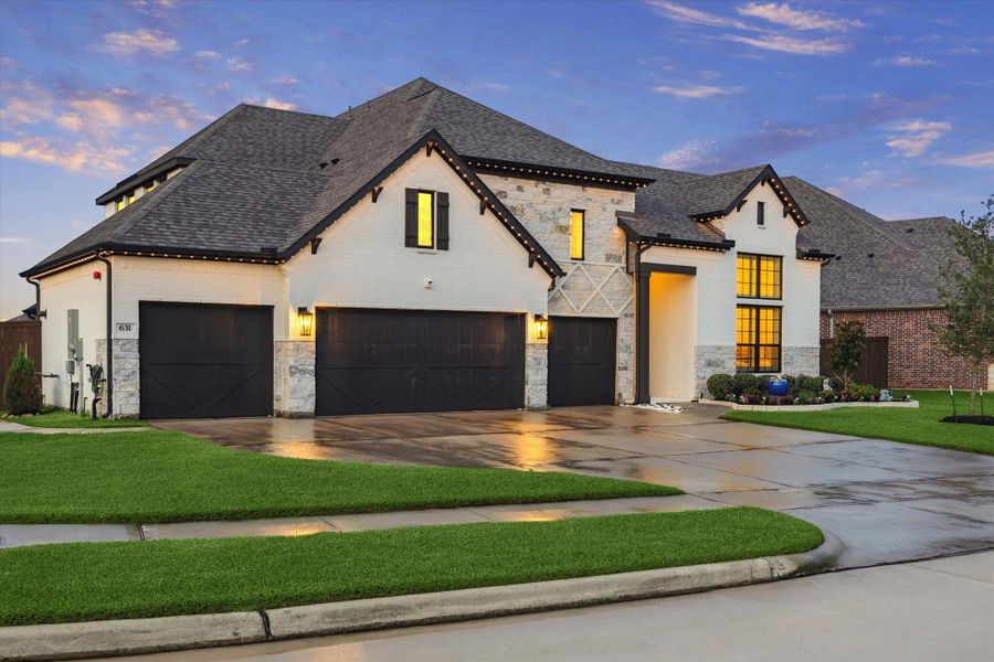 Extra large driveway and 4-car garage Extra large driveway and 4-car garage