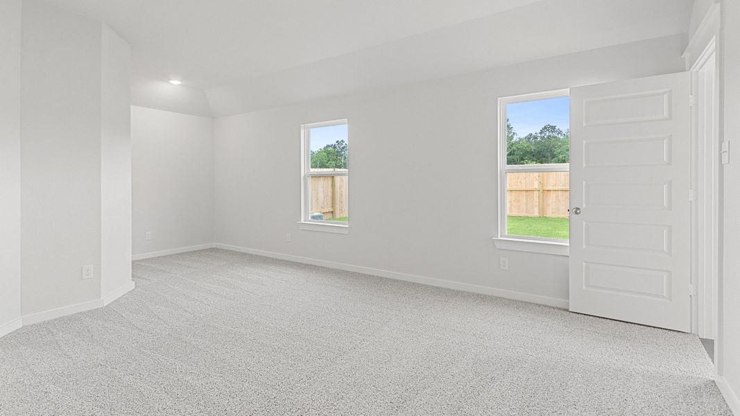 Representative furnished interior of a home built from the Kimbell by Brightland Homes in Sunterra, Katy (Image 11).