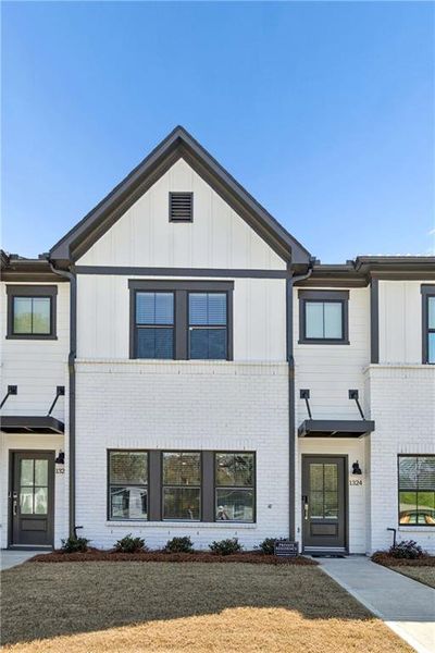 Front exterior of a new home in , Atlanta, GA, highlighting curb appeal (Image 22).