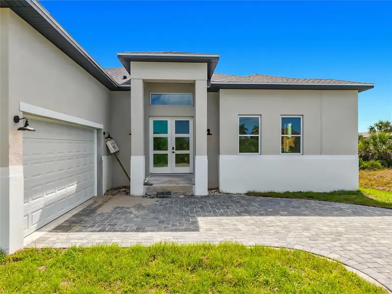 Exterior details and patio area of a home in , Port Charlotte (Image 3).
