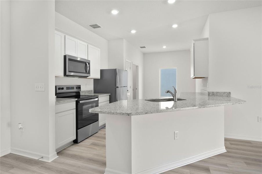 Furnished interior view inside a new home in Tula Parc, Astatula (Image 5). Furnished interior view inside a new home in Tula Parc, Astatula (Image 5).