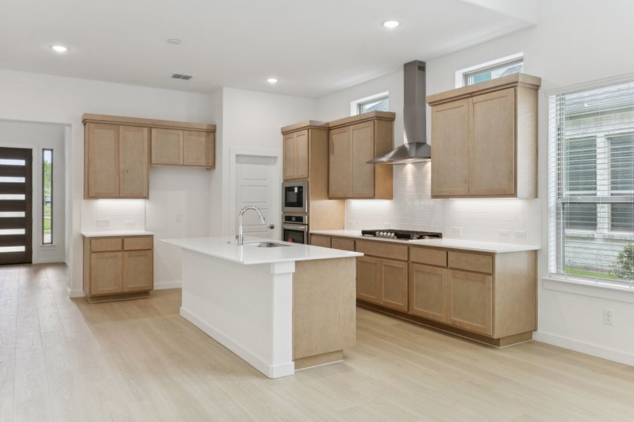 Kitchen in the Monet II home plan by Trophy Signature Homes – REPRESENTATIVE PHOTO Kitchen in the Monet II home plan by Trophy Signature Homes – REPRESENTATIVE PHOTO