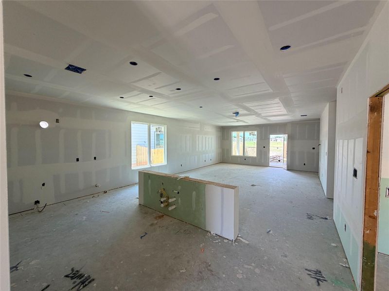 An open floorplan with high ceilings and ample natural light awaits your personal touch.