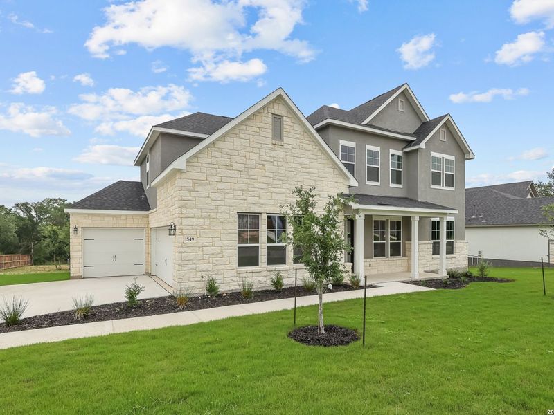 Front exterior of a new home in Potranco Oaks, Castroville, TX, highlighting curb appeal (Image 28). Front exterior of a new home in Potranco Oaks, Castroville, TX, highlighting curb appeal (Image 28).