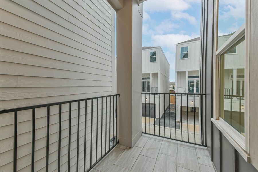 Exterior details and patio area of a home in , Houston (Image 3).