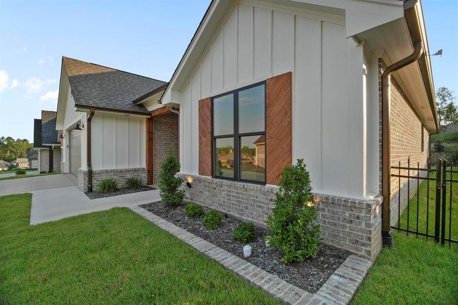 Front exterior of a new home in , Tyler, TX, highlighting curb appeal (Image 28). Front exterior of a new home in , Tyler, TX, highlighting curb appeal (Image 28).