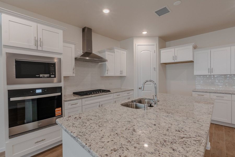 Furnished interior view inside a new home in Paseo Del Este, El Paso (Image 7).