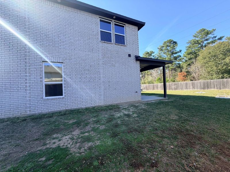 Exterior details and patio area of a home in , Houston (Image 27).