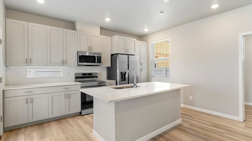 Furnished interior view inside a new home in Reunion, Commerce City (Image 6).