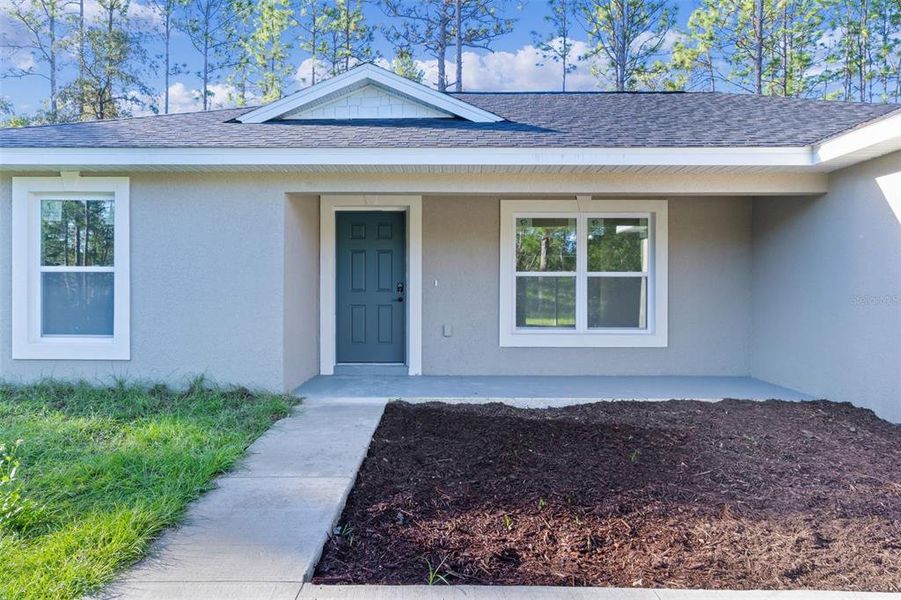 Exterior details and patio area of a home in , Citrus Springs (Image 28).