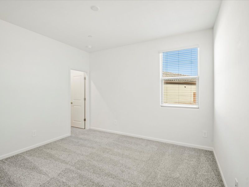 Spacious, unfurnished interior of a new home in Arbor at Madera Highlands II, Sahuarita (Image 16).
