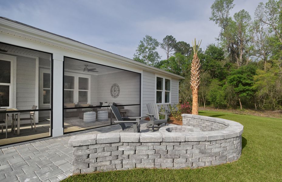 Spacious screened in porch and fire pit on the patio to gather and relax with friends