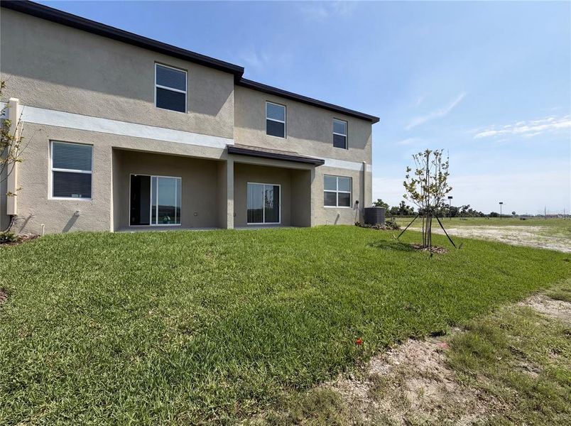 Exterior details and patio area of a home in , Parrish (Image 3). Exterior details and patio area of a home in , Parrish (Image 3).