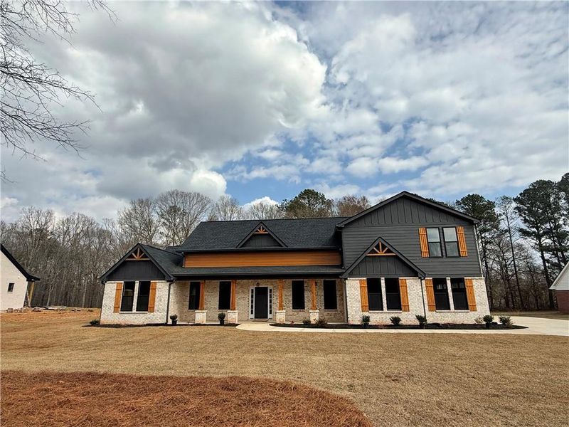Front exterior of a new home in , Covington, GA, highlighting curb appeal (Image 28).