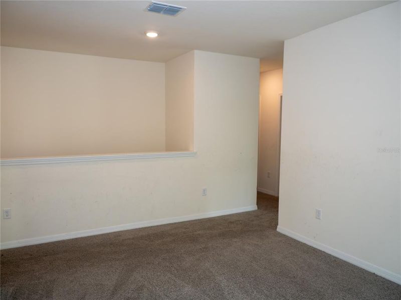 Spacious, unfurnished interior of a new home in Poinciana Enclave, Kissimmee (Image 12).