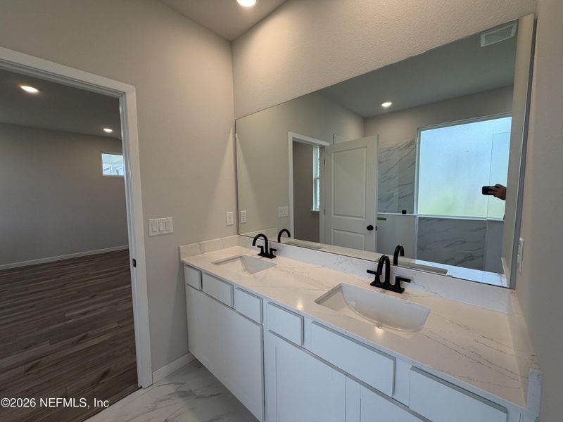 Furnished interior view inside a new home in Reserve East, Flagler Beach (Image 12).