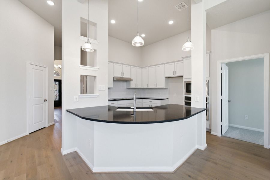 Furnished interior view inside a new home in The Woodlands at Medina Hills, Mico (Image 7).