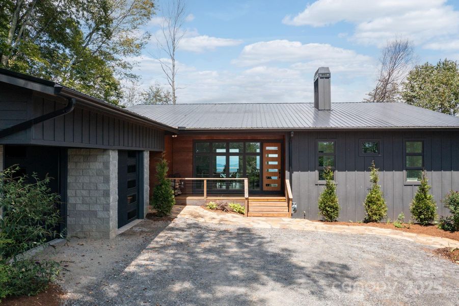 Front exterior of a new home in , Leicester, NC, highlighting curb appeal (Image 19).
