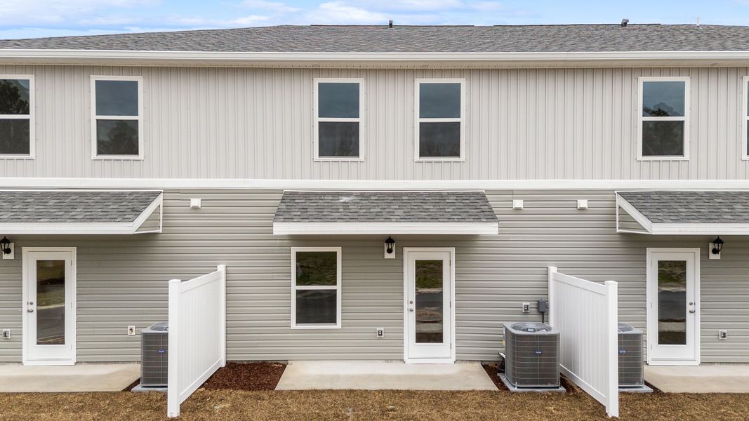 Representative exterior details of a home built from the Palm Interior by D.R. Horton in Genoa Landing Townhomes, Freeport (Image 3).