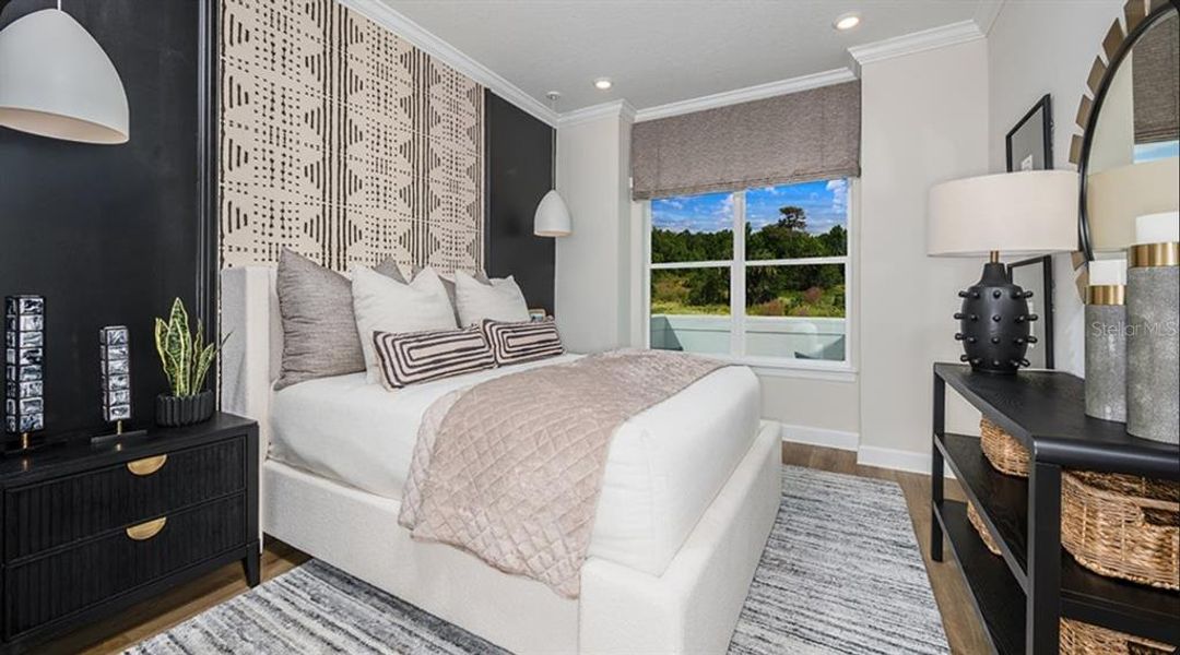 Furnished interior view inside a new home in Esplanade at McKinnon Groves, Winter Garden (Image 8).