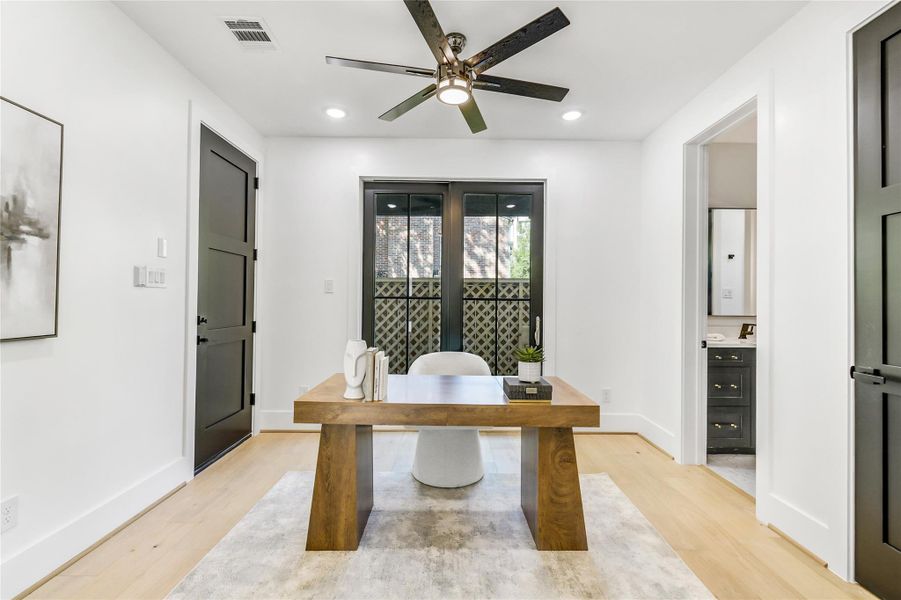 Private first-floor study with French doors and large windows that fill the space with natural light—ideal for executives or medical professionals needing a quiet workspace at home. Private first-floor study with French doors and large windows that fill the space with natural light—ideal for executives or medical professionals needing a quiet workspace at home.