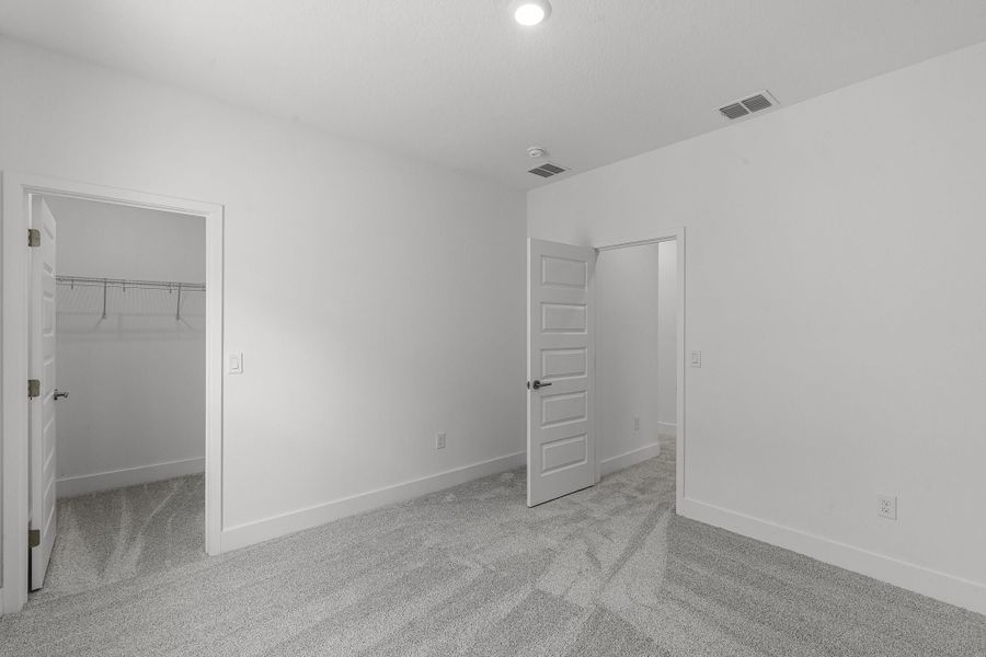Representative unfurnished interior of a home built from the Franklin by Rockwell Homes in Harvest at Ovation - Townhomes, Winter Garden (Image 55). Representative unfurnished interior of a home built from the Franklin by Rockwell Homes in Harvest at Ovation - Townhomes, Winter Garden (Image 55).
