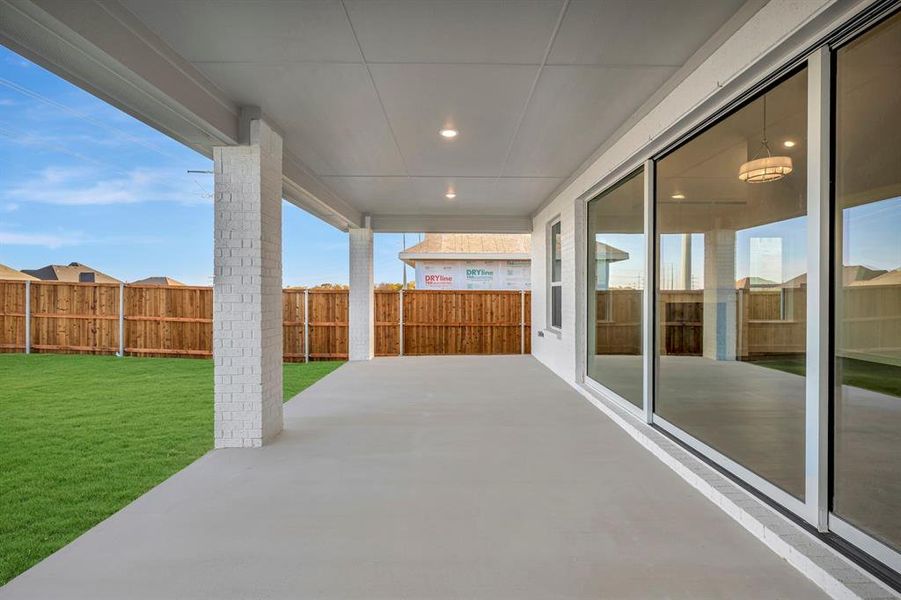 Exterior details and patio area of a home in Wellington, Fort Worth (Image 23).