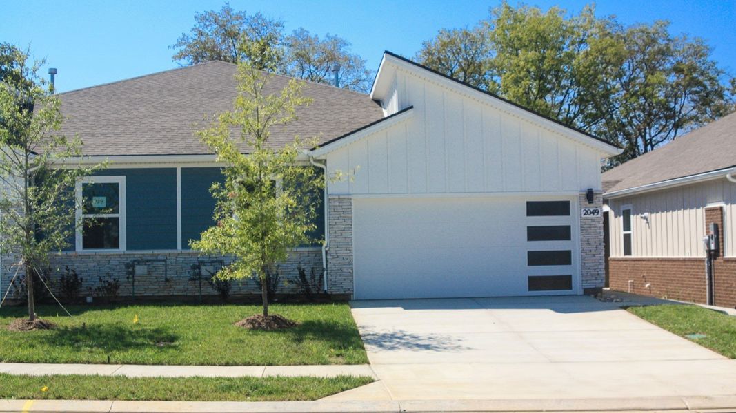Front exterior of a new home in Nexus South, Gallatin, TN, highlighting curb appeal (Image 2).