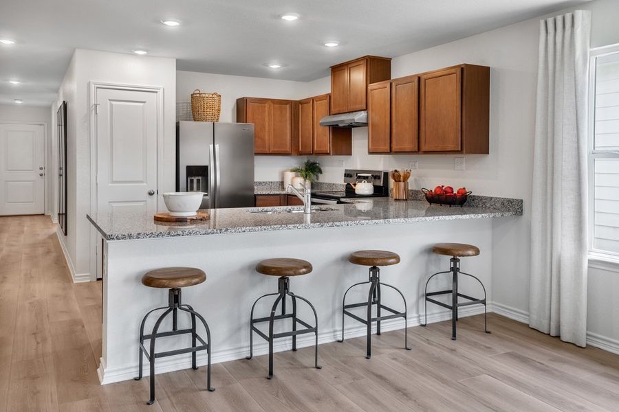 Furnished interior in a model home at The Granary - Villa Collection in San Antonio (Image 10).