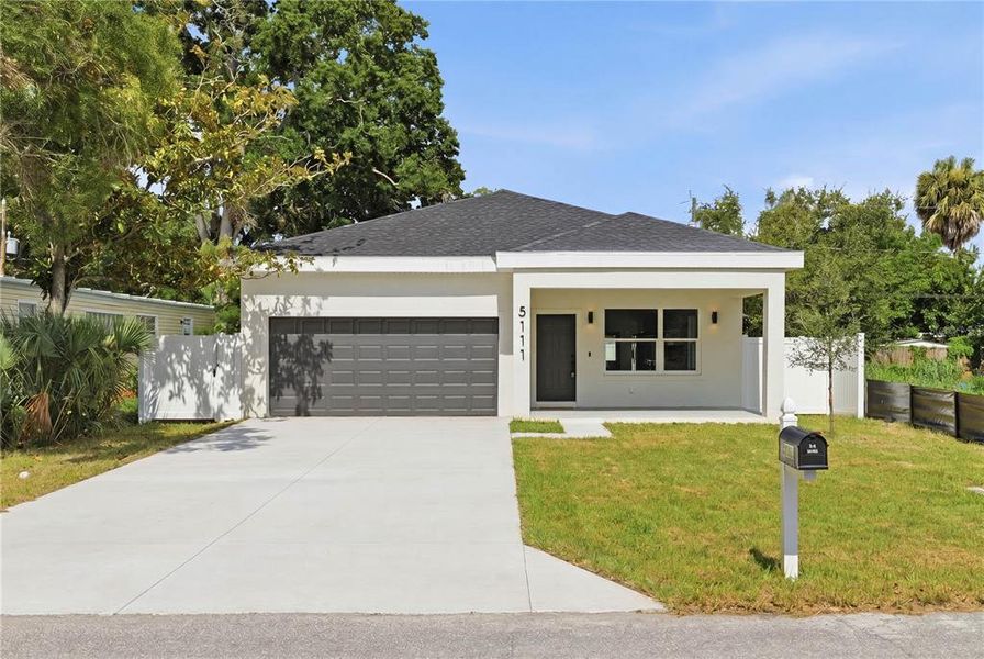 Front exterior of a new home in , St. Petersburg, FL, highlighting curb appeal (Image 16). Front exterior of a new home in , St. Petersburg, FL, highlighting curb appeal (Image 16).