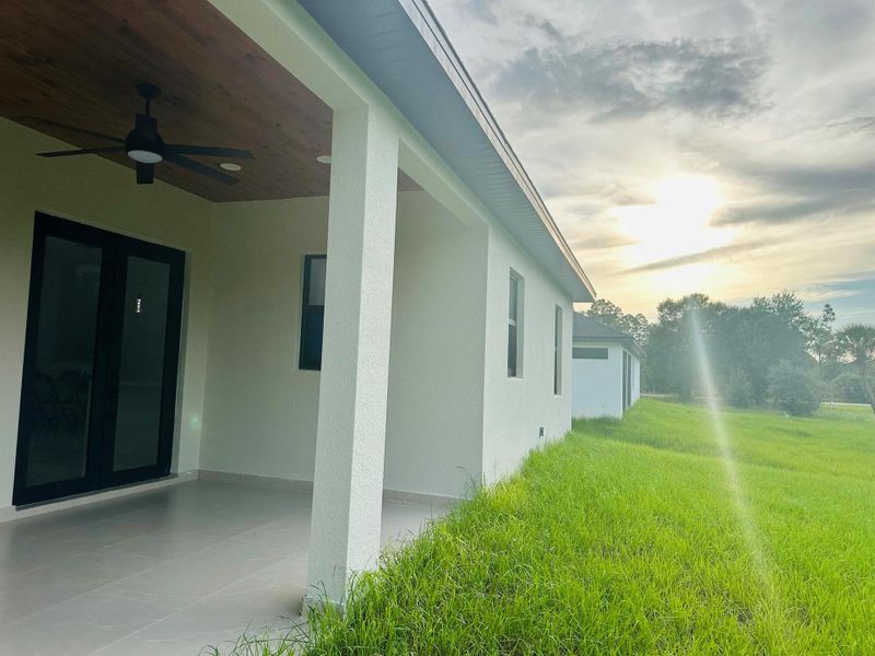 Front exterior of a new home in , Lehigh Acres, FL, highlighting curb appeal (Image 18).