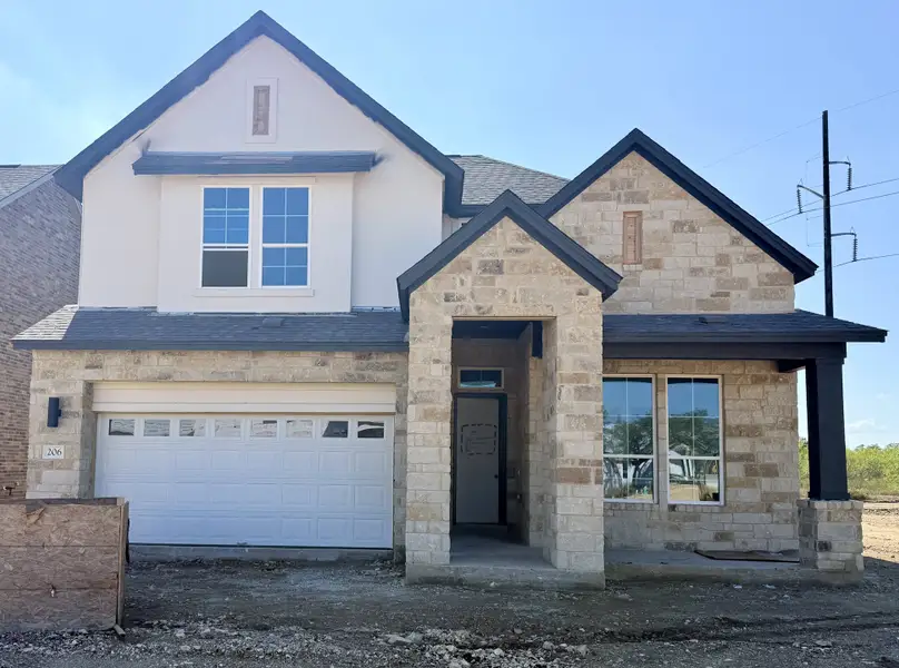 Exterior details and patio area of a home in Persimmon, Buda (Image 3). Exterior details and patio area of a home in Persimmon, Buda (Image 3).