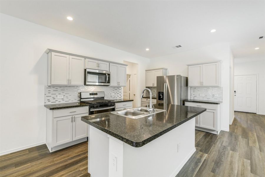 Furnished interior view inside a new home in Breckenridge Forest, Spring (Image 5). Furnished interior view inside a new home in Breckenridge Forest, Spring (Image 5).