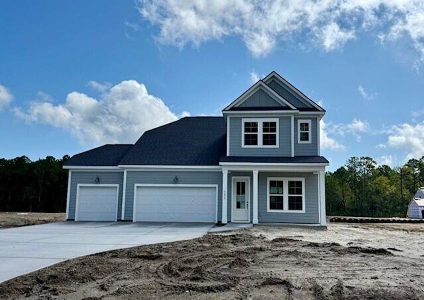Front exterior of a new home in Pamlico Terrace, Awendaw, SC, highlighting curb appeal (Image 1).