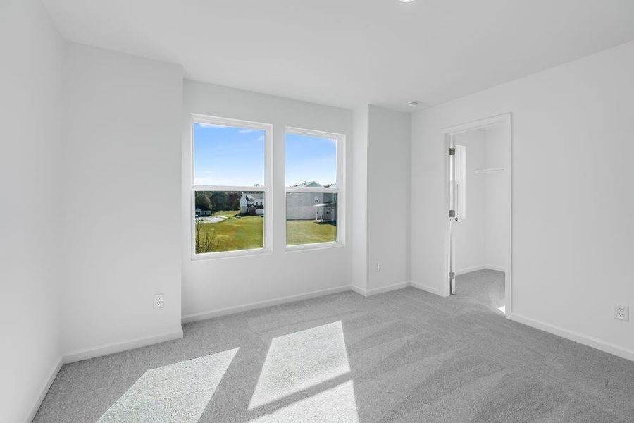 Spacious, unfurnished interior of a new home in Windance Lake, Loganville (Image 34).