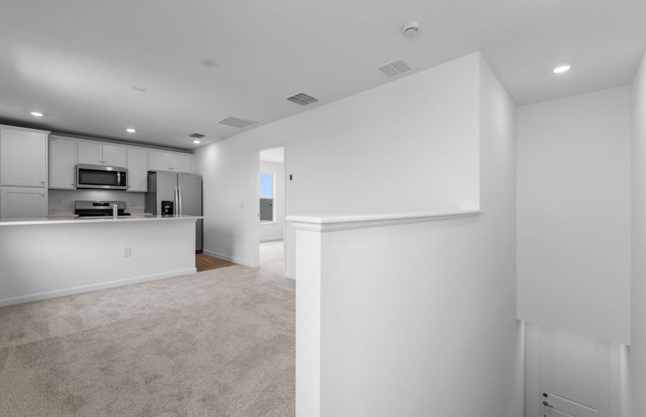 Representative unfurnished interior of a home built from the Mabel II with ADU by Pulte Homes in SeaFlower, Bradenton (Image 27).