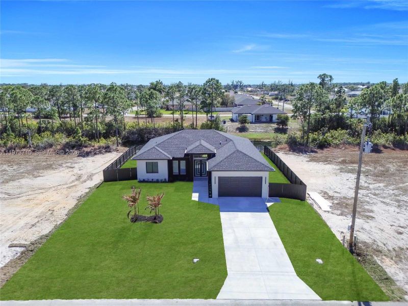 Front exterior of a new home in , Cape Coral, FL, highlighting curb appeal (Image 17).