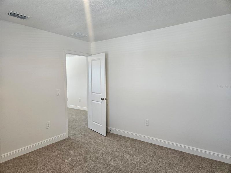 Spacious, unfurnished interior of a new home in The Reserve at Hammock Oaks - Classic Series, Lady Lake (Image 33).