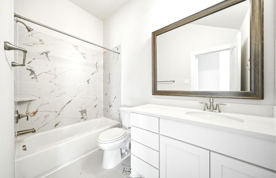 Furnished interior view inside a new home in Bridgeland 60′, Cypress (Image 8).
