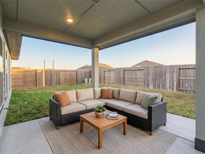 Exterior details and patio area of a home in Sunterra, Katy (Image 4).