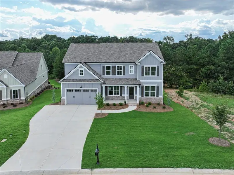 Front exterior of a new home in , Jefferson, GA, highlighting curb appeal (Image 2).