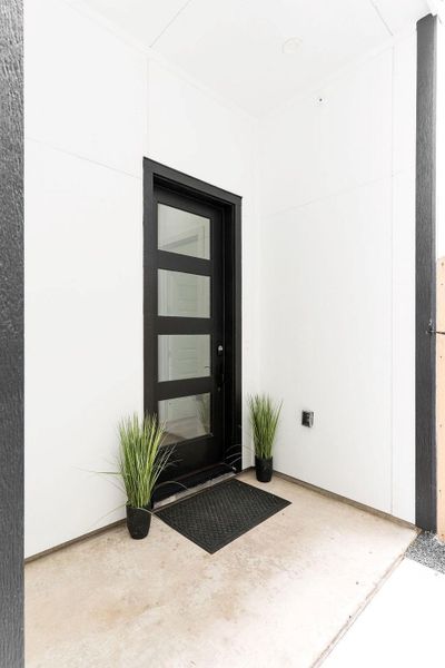 Exterior details and patio area of a home in , Houston (Image 3).