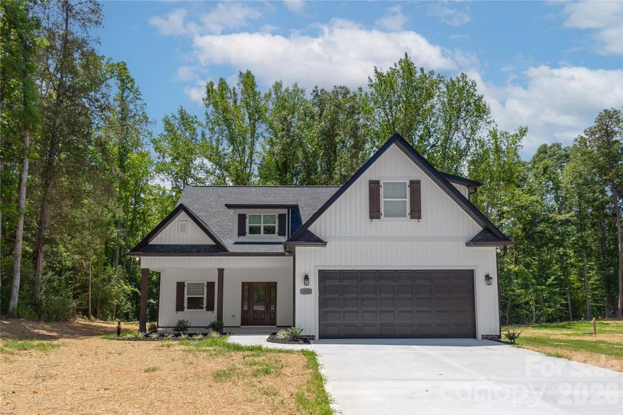 Front exterior of a new home in , Stanley, NC, highlighting curb appeal (Image 23).