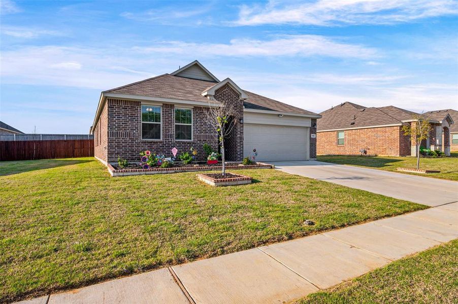 Front exterior of a new home in Azle Grove, Azle, TX, highlighting curb appeal (Image 25).