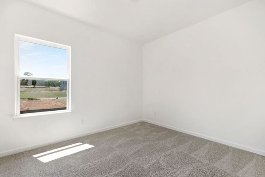 Representative unfurnished interior of a home built from the Shaw by True Homes in Whispering Hills, Locust (Image 18).
